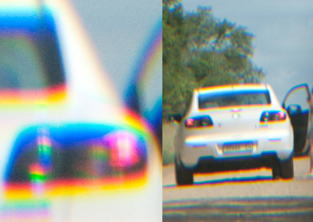 A photo of a white car with vertical red and blue color fringes.