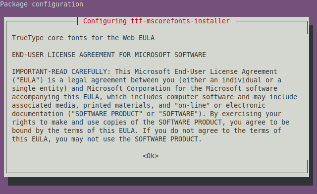 A grey rectangle dialog box on a purple background, titled "Configuring ttf-mscorefonts-installer," with an button at the bottom