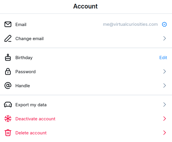 An page titled "Account." Options: Email (me@virtualcuriosities.com), Change email, Birthday (Edit), Password, Handle, Export my data, Deactivate account, Delete account.